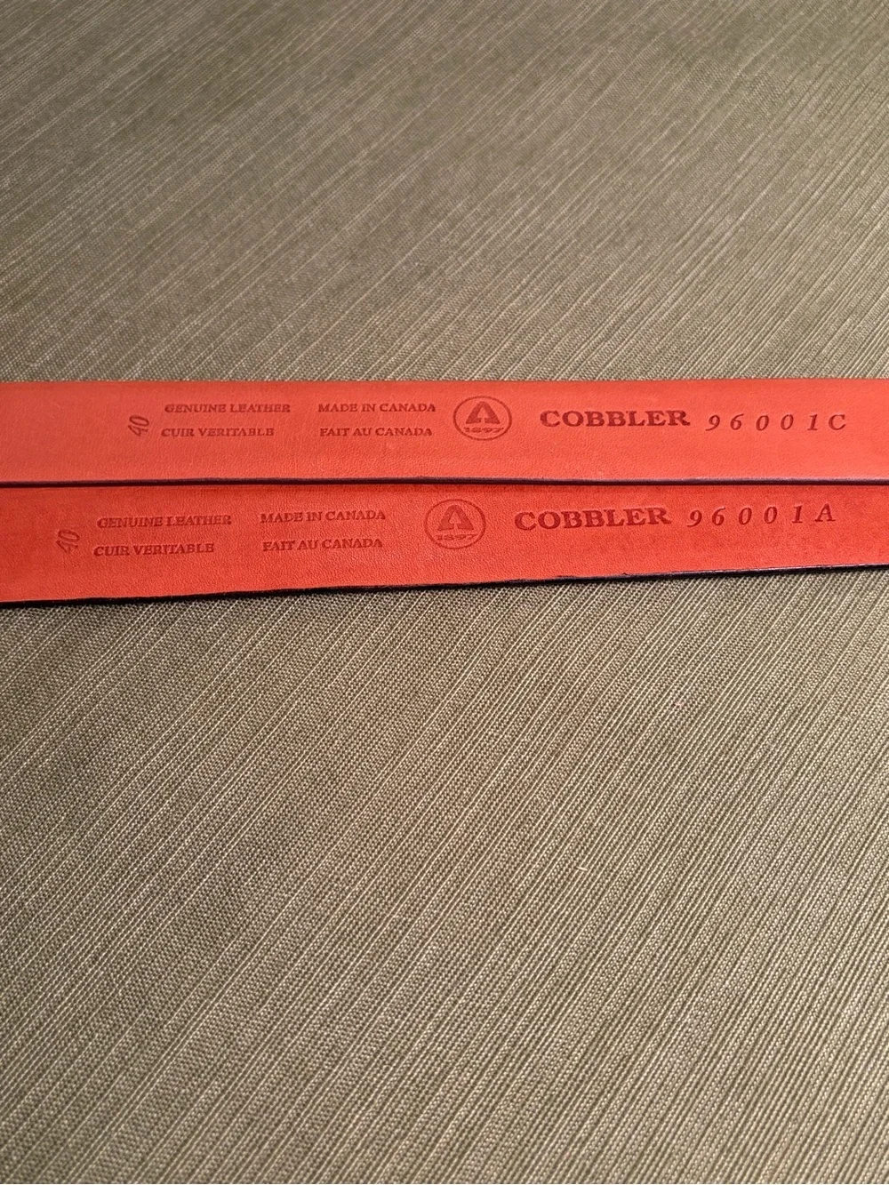 Pair of Cobbler made in Canada smooth leather belts size 40.